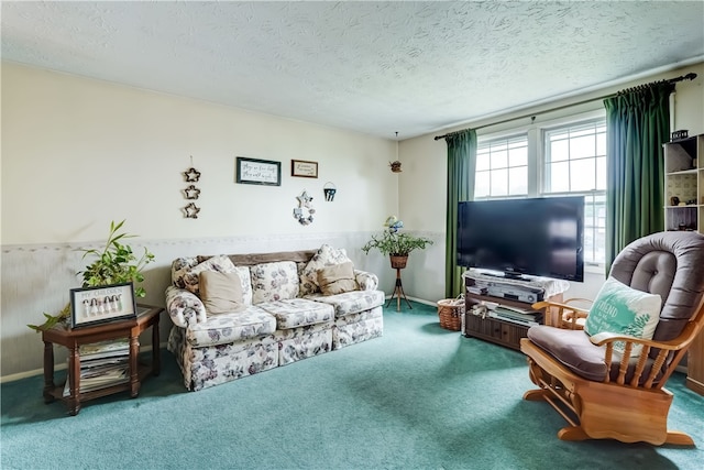 living room featuring carpet and a textured ceiling