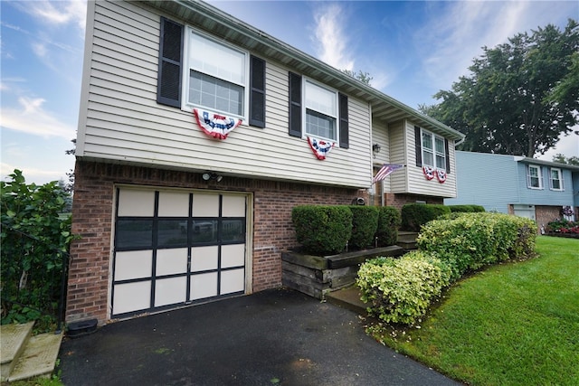 bi-level home featuring a garage