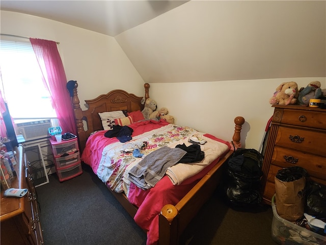 carpeted bedroom with cooling unit and vaulted ceiling