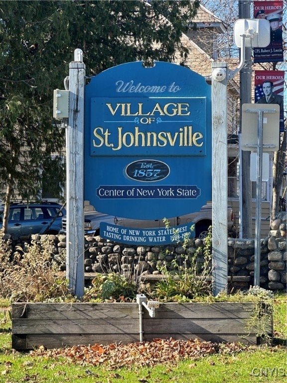 view of community sign