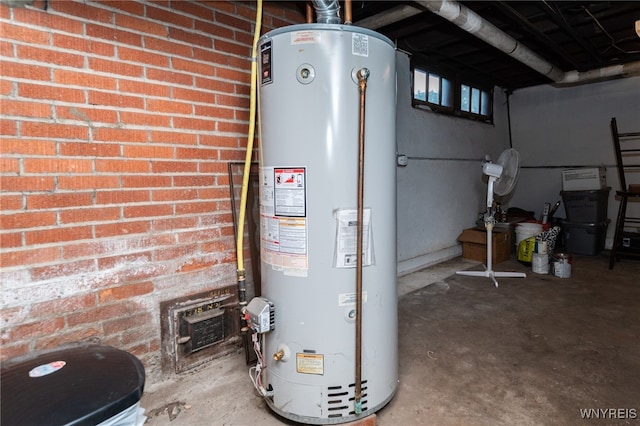 utility room with water heater