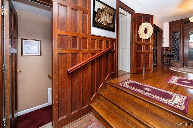 hall featuring wood-type flooring