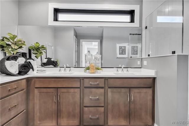 bathroom with vanity and walk in shower