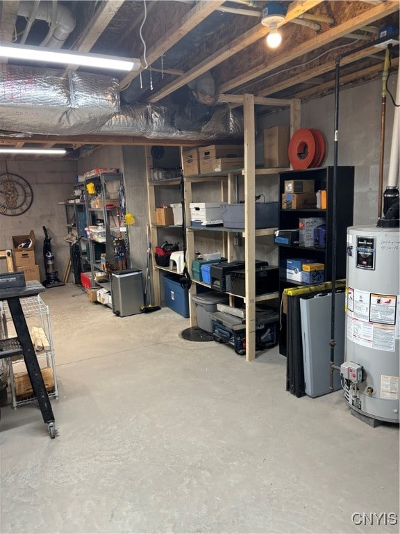 storage room featuring water heater