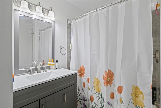 bathroom featuring vanity and walk in shower