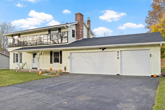 view of front of property featuring a garage