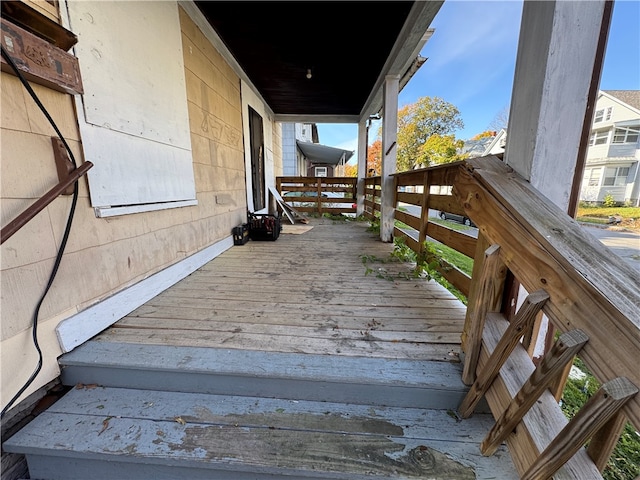 wooden terrace with covered porch