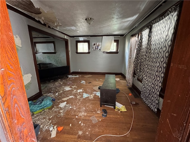 unfurnished room featuring a textured ceiling