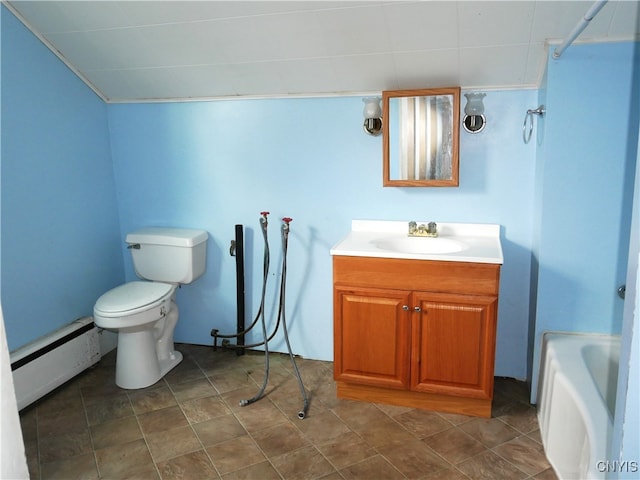 bathroom with vanity, toilet, a washtub, and a baseboard heating unit