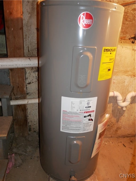 utility room featuring water heater