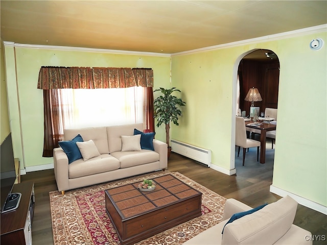 living room with dark hardwood / wood-style floors, baseboard heating, and ornamental molding