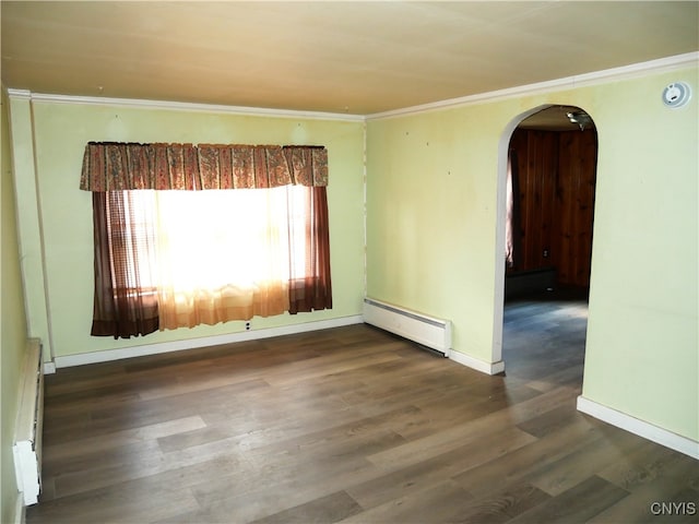 unfurnished room featuring crown molding, dark hardwood / wood-style flooring, and a baseboard radiator