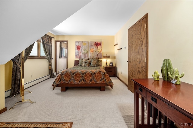 carpeted bedroom with baseboard heating