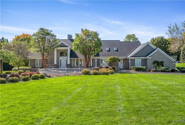 view of front facade with a front yard