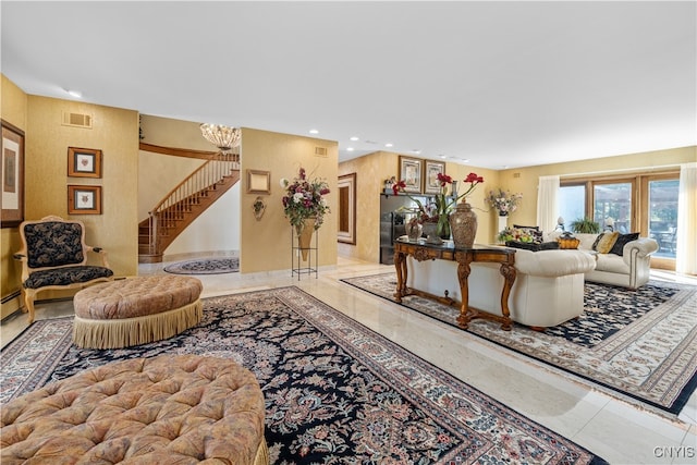 living room with an inviting chandelier