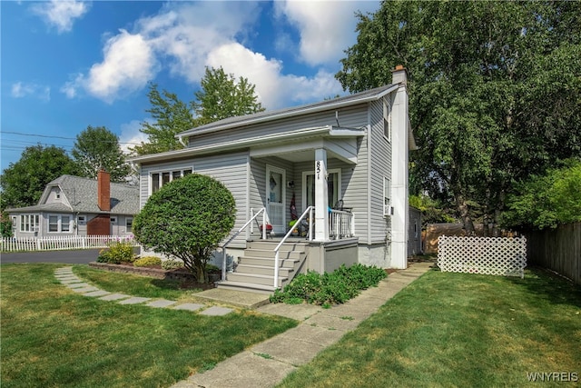 bungalow with a front lawn