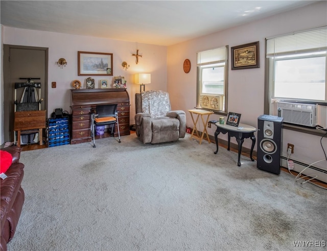 living area with carpet floors, cooling unit, and baseboard heating