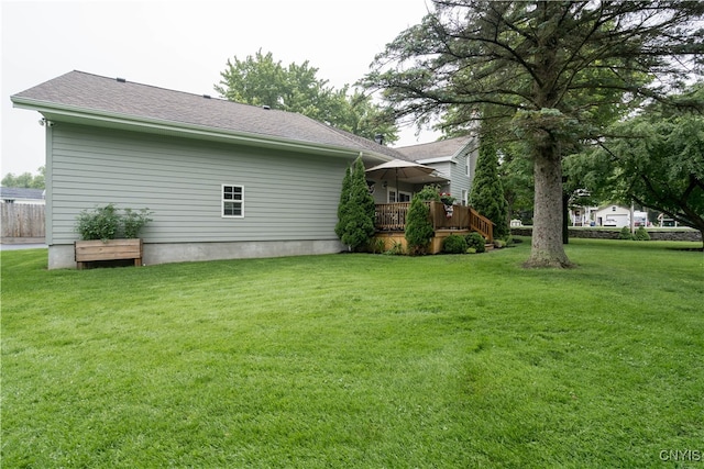 view of yard with a deck