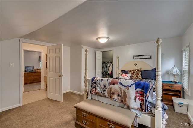 bedroom featuring light carpet