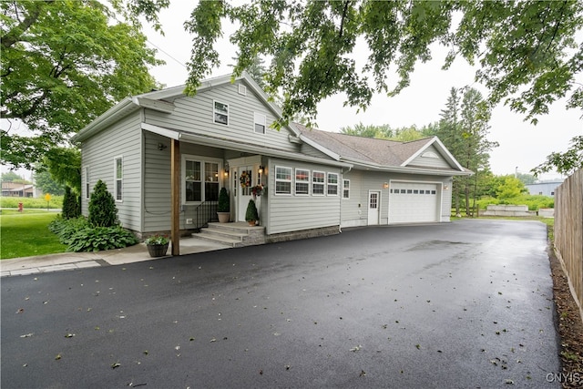 view of front of property with a garage