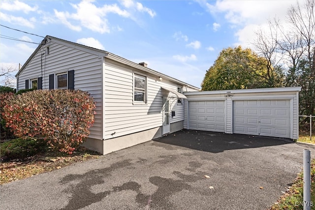 exterior space with a garage