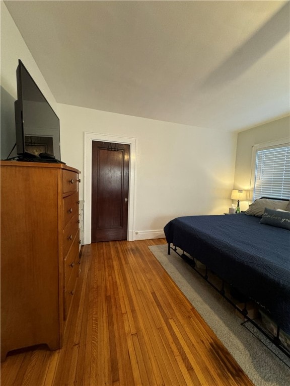 bedroom featuring hardwood / wood-style flooring