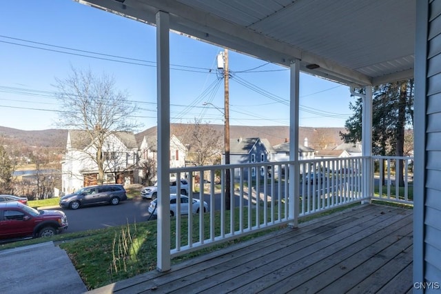 wooden deck featuring covered porch