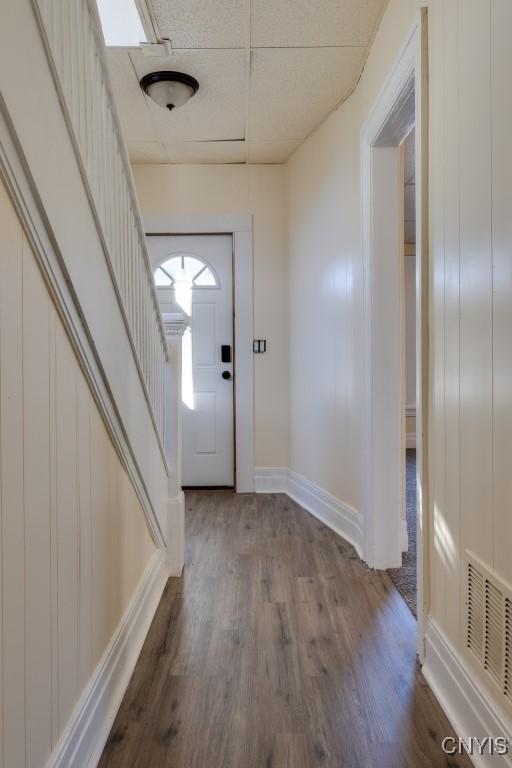 entryway featuring hardwood / wood-style floors and a paneled ceiling