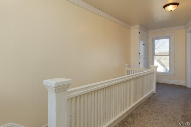 corridor with carpet flooring