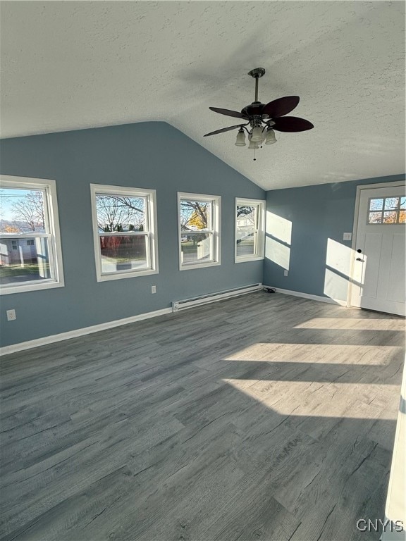 unfurnished living room featuring lofted ceiling, ceiling fan, a textured ceiling, a baseboard radiator, and wood-type flooring