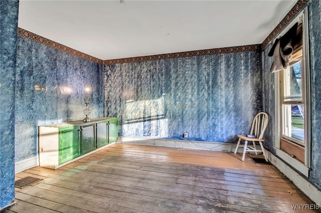 empty room featuring wood-type flooring