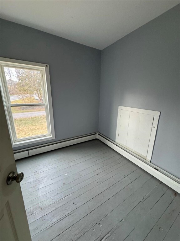 empty room with light wood-type flooring