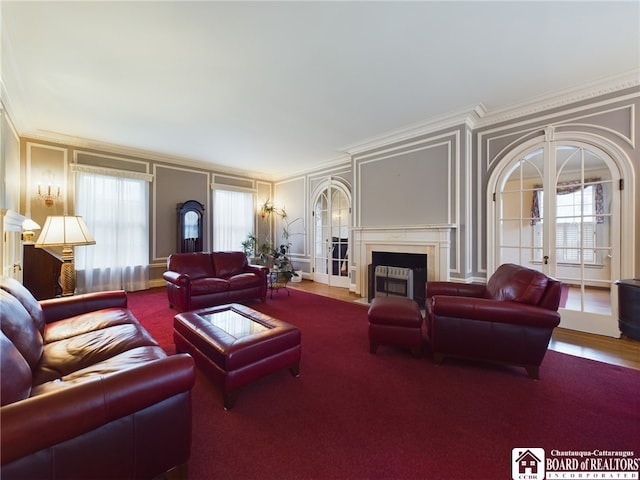 living room with french doors and ornamental molding