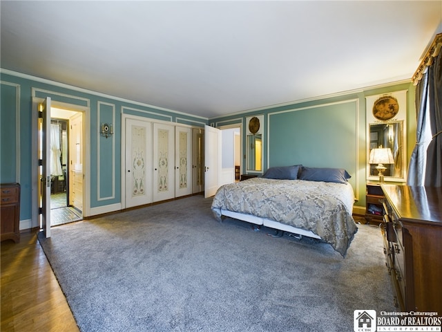 bedroom with hardwood / wood-style flooring