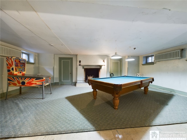 playroom with wood-type flooring, an AC wall unit, and pool table