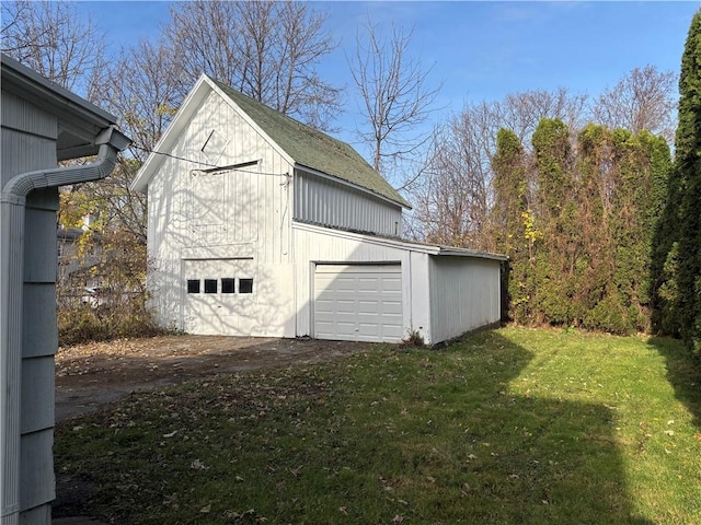 garage with a lawn