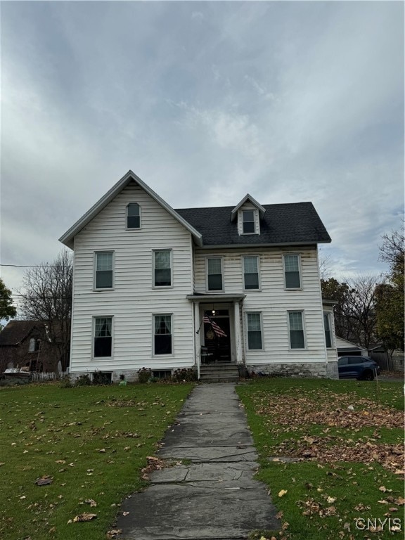 view of front of house featuring a front yard