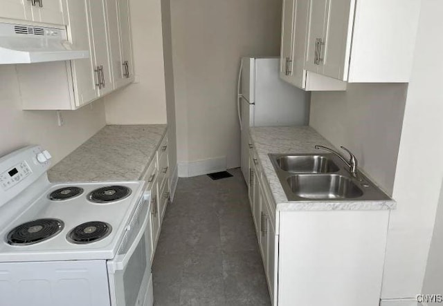 kitchen with white cabinets, white range with electric cooktop, under cabinet range hood, and a sink