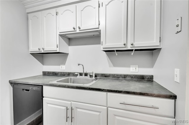 kitchen featuring white cabinets, sink, and black dishwasher