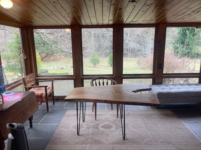 sunroom / solarium with wood ceiling