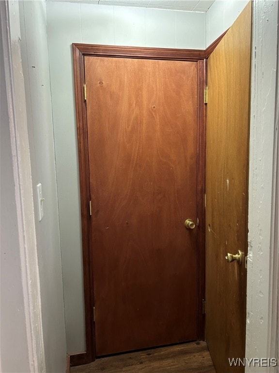 corridor featuring hardwood / wood-style flooring