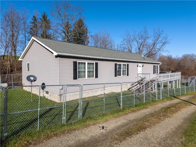 view of property exterior with a yard