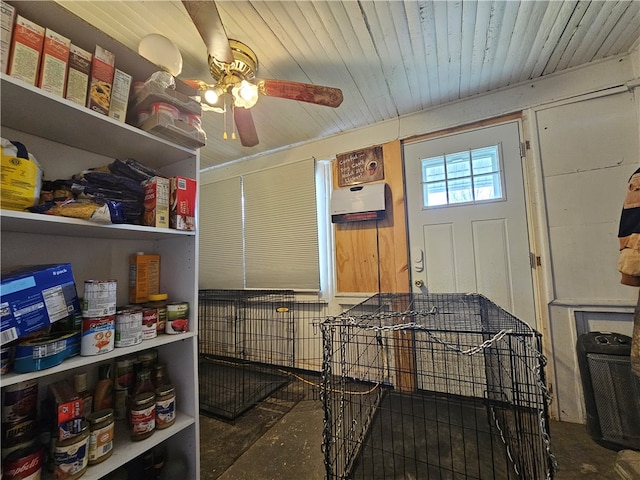 interior space featuring ceiling fan