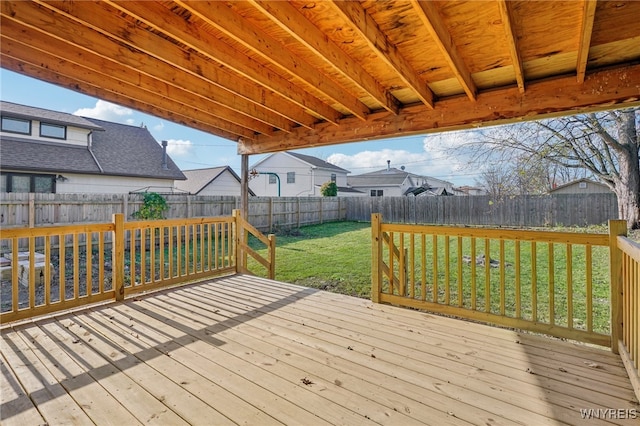 wooden deck with a yard