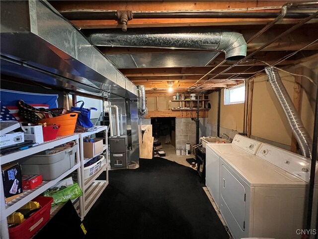 basement with washing machine and dryer