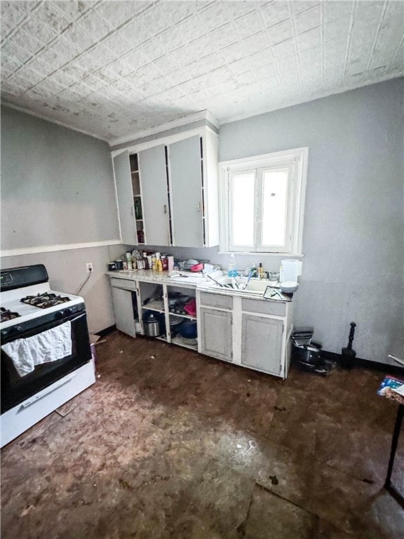 kitchen with white gas range oven