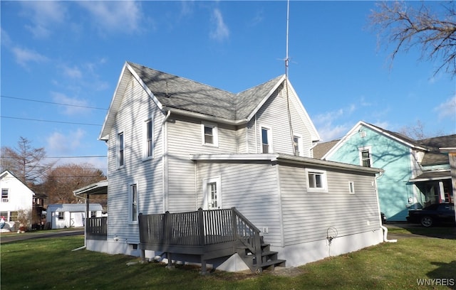 back of house featuring a yard