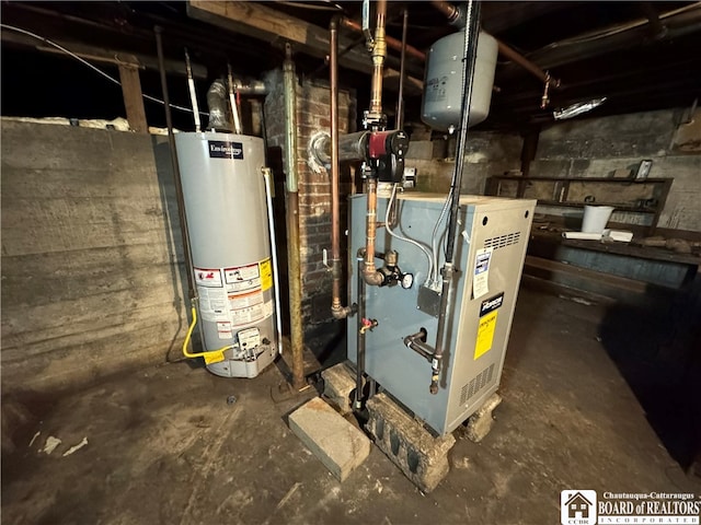 utility room featuring gas water heater