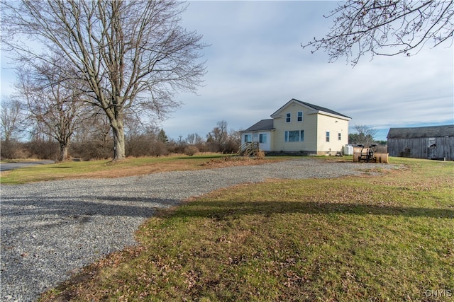 exterior space featuring a yard