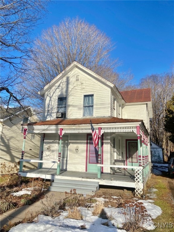 view of front of home featuring covered porch